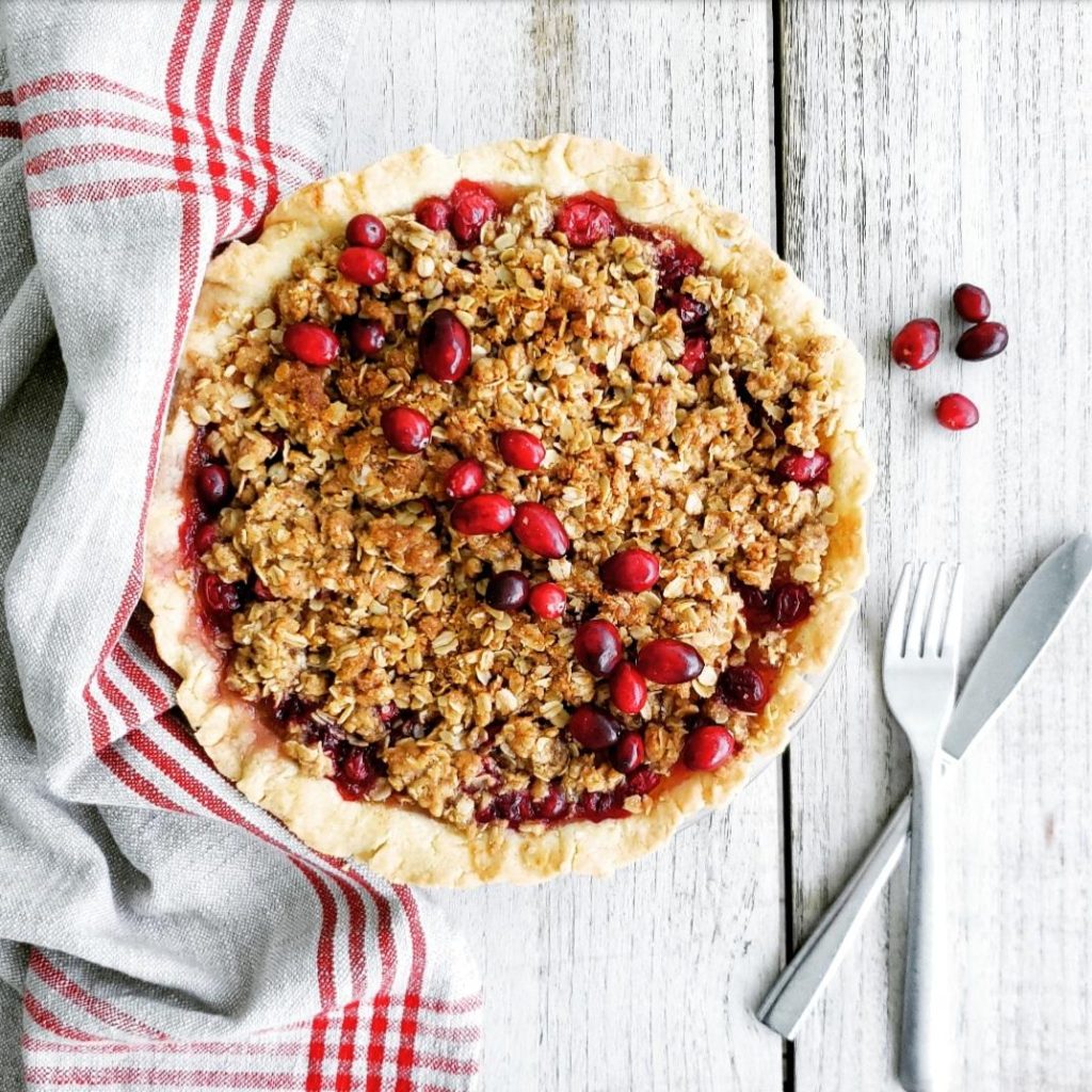 functional image cranberry apple crumble pie recipe full pie uncut with fresh cranberries on top