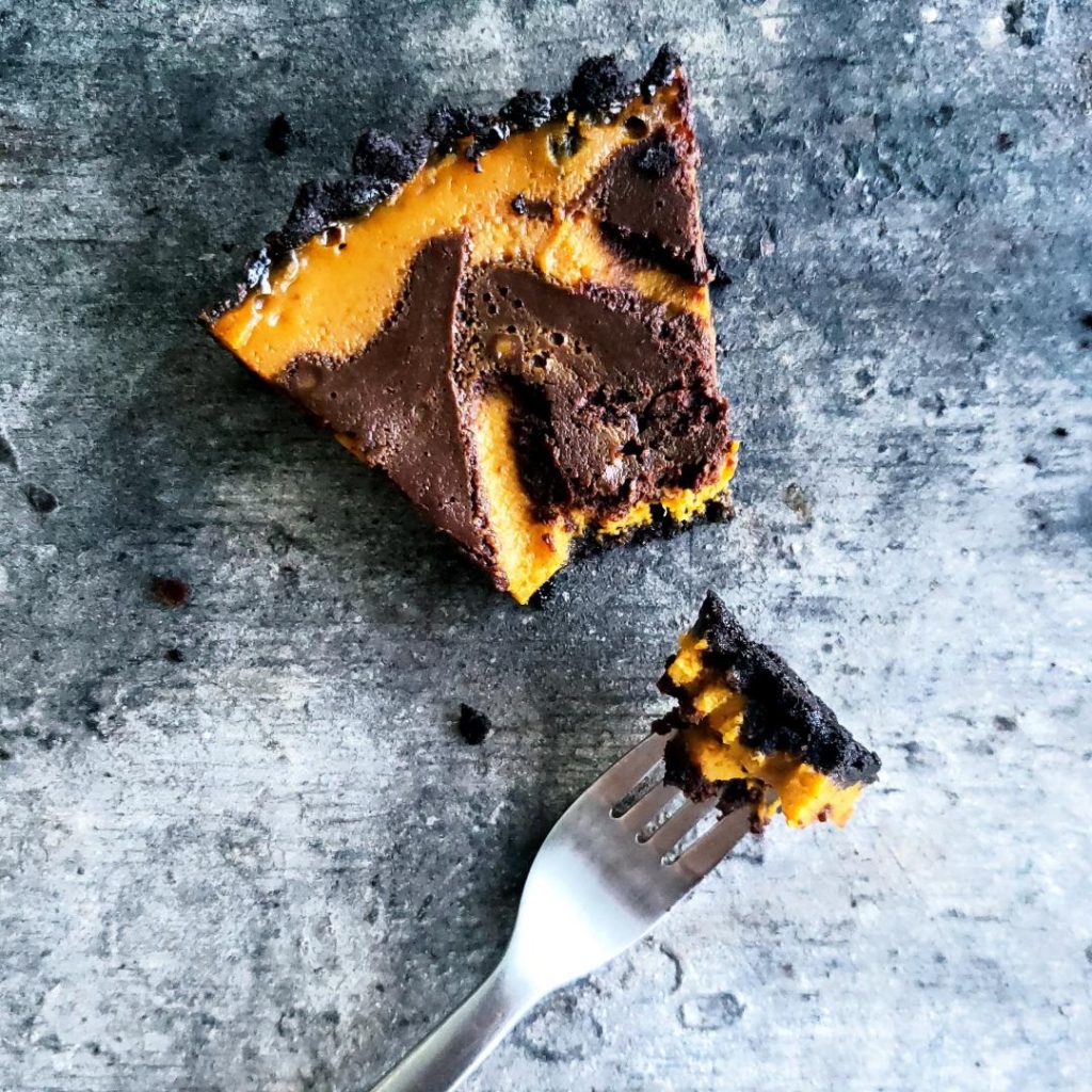 functional image double chocolate pumpkin pie with oreo crust slice with a forkful 