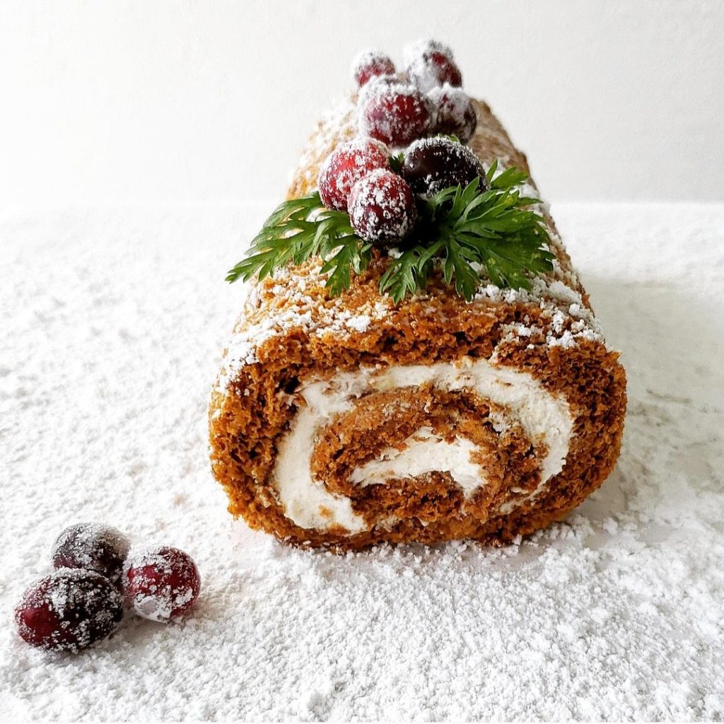 functional image gingerbread cake roll recipe uncut with sugared cranberries