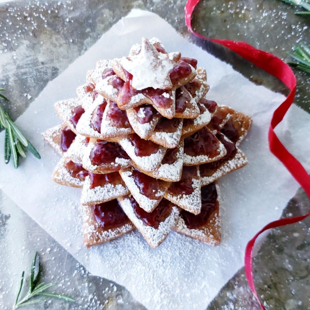 functional image gingerbread star cookie tree with red ribbon