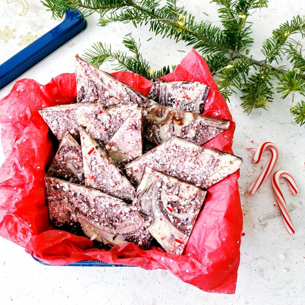 boozy peppermint bark in a tin