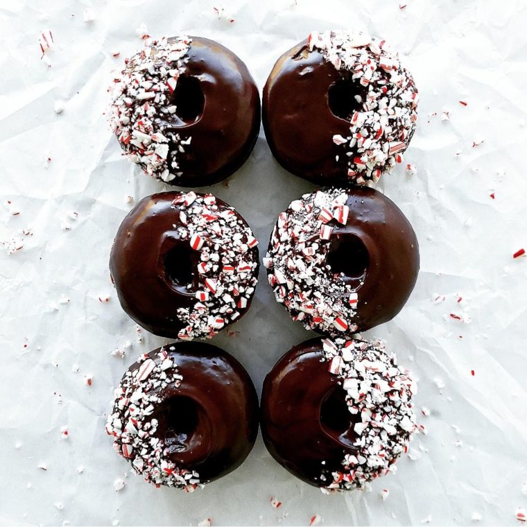 functional image chocolate donuts with peppermint schnapps glaze 6 donuts in 2 rows top down with crushed candy canes