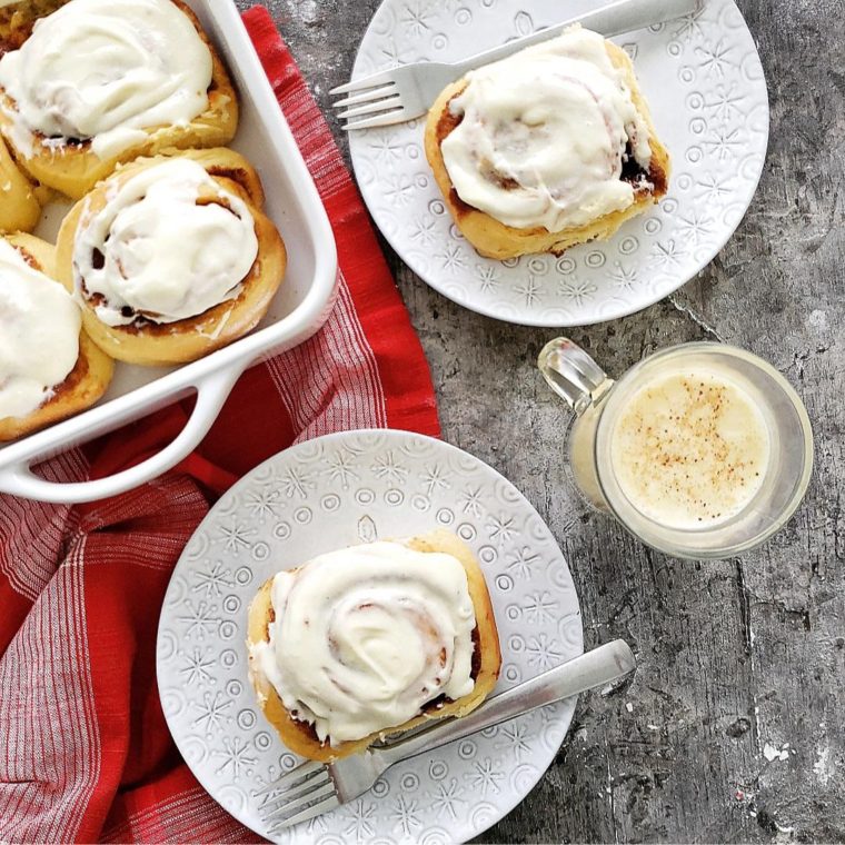 functional image spiked eggnog cinnamon rolls two plates and baking pan