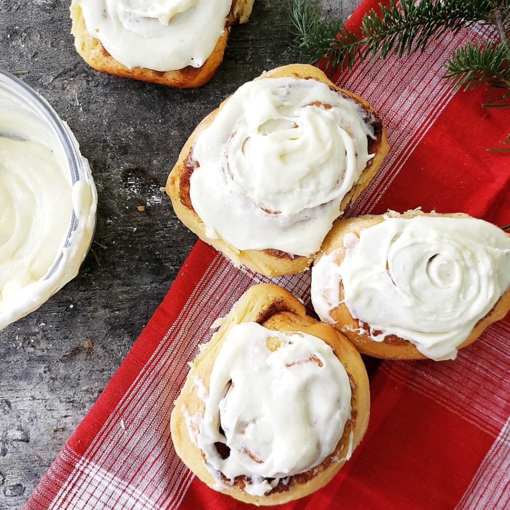 functional image spiked eggnog cinnamon rolls recipe with frosting bowl