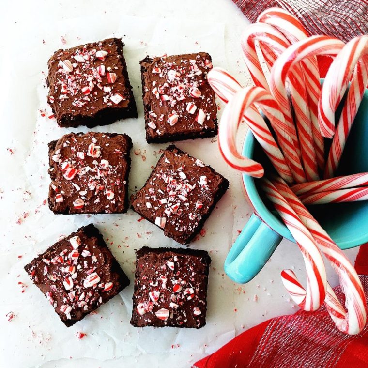 functional image peppermint brownies with whipped ganache and coffee cup of candy canes