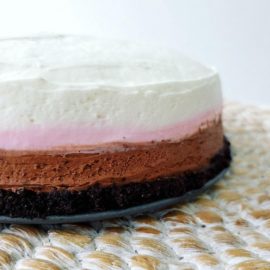 functional image neapolitan cheesecake no bake chocolate vanilla strawberry triple layer cheesecake oreo crust
