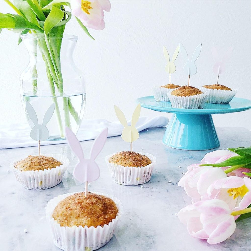 functional image cinnamon muffins easter muffins blue cake plate and pink tulips