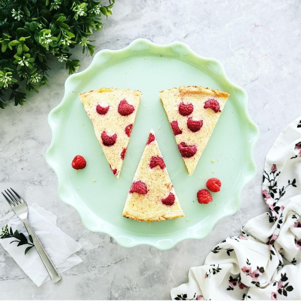 functional image mascarpone raspberry art green fluted plate 3 triangle slices