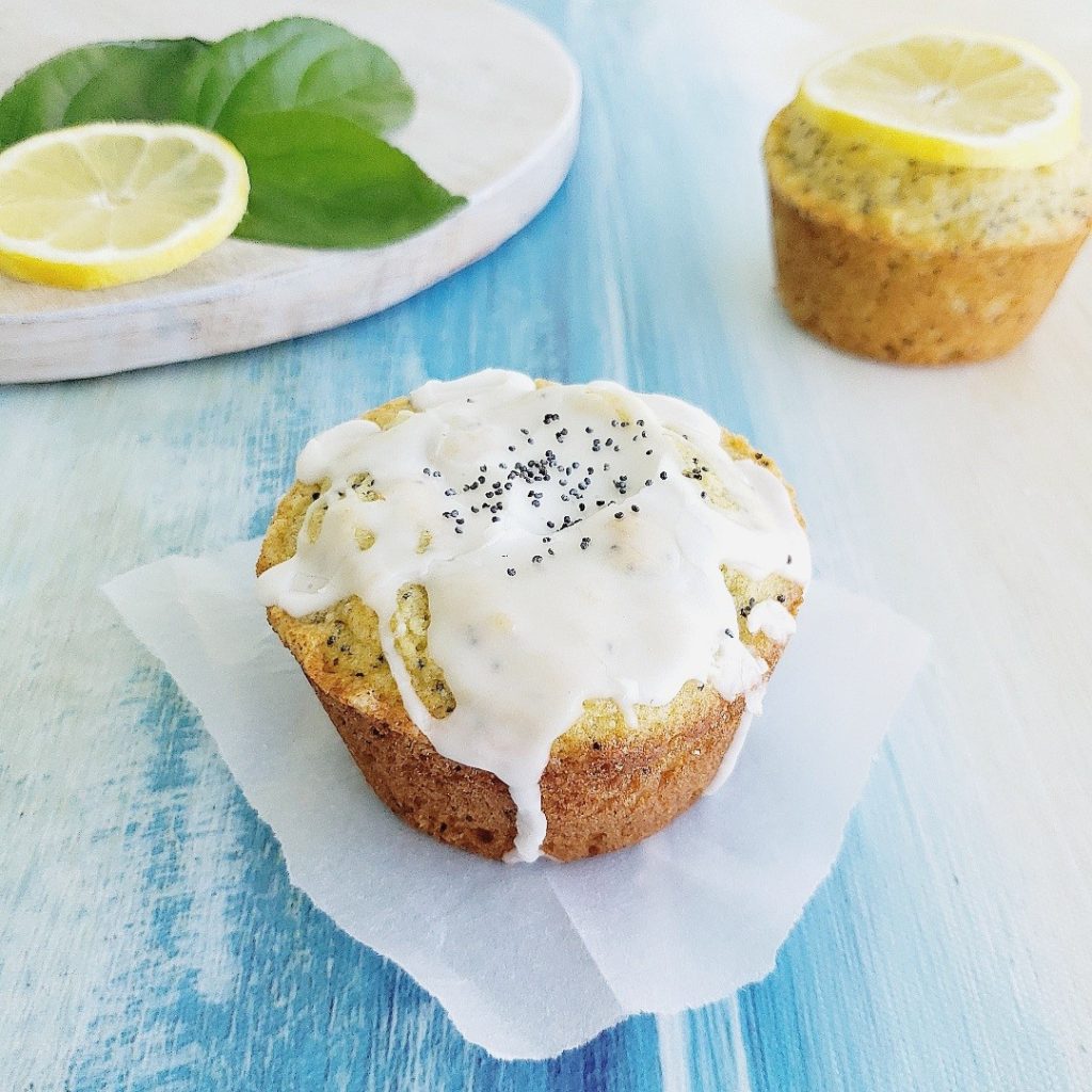functional image lemon poppy seed muffins with lemon glaze bakery style lemon muffins close up photo on blue background