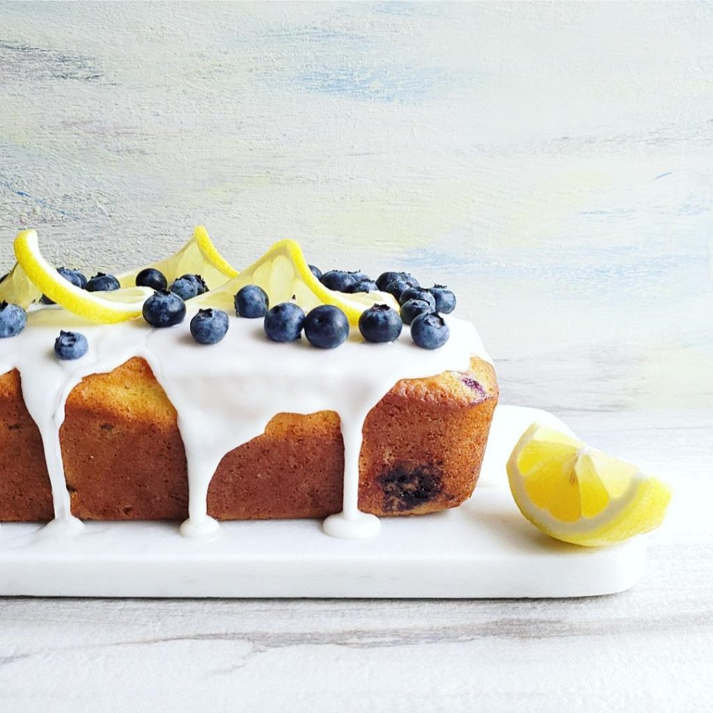 functional image blueberry lemon bread lemon blueberry bread icing drip fresh blueberries quick bread recipe