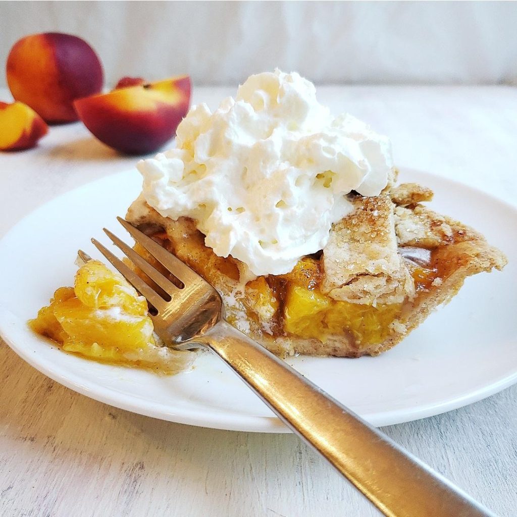 functional image recipe for peach pie rustic pie pie with peaches whipped cream fork fruit pie
