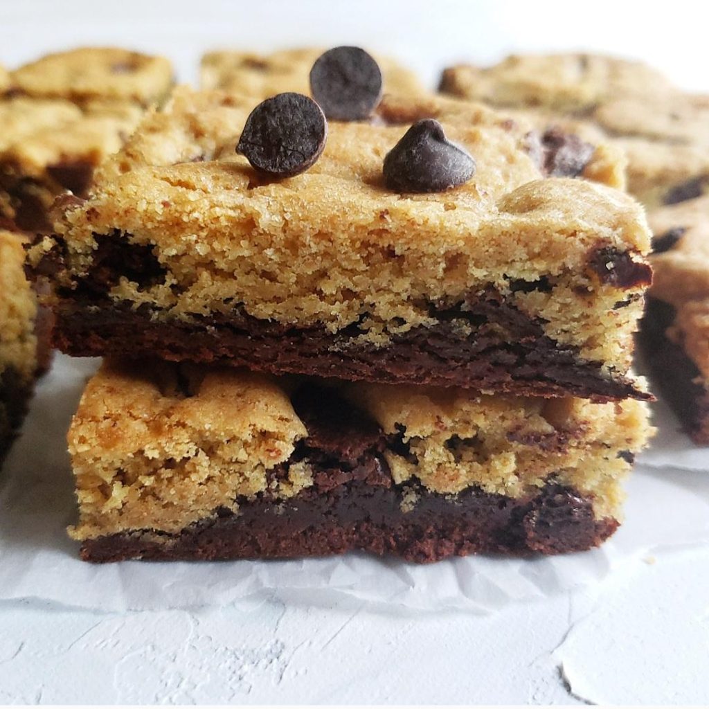 functional image chocolate chip cookie brownies with chocolate chips cut into squares and stacked 2 high brookies brownies