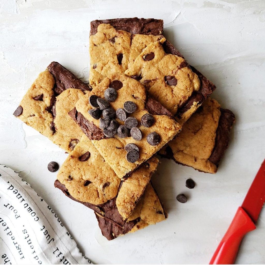 functional image chocolate chip cookie brownies with chocolate chips cut into squares with a red knife brookies brownies brookies recipe