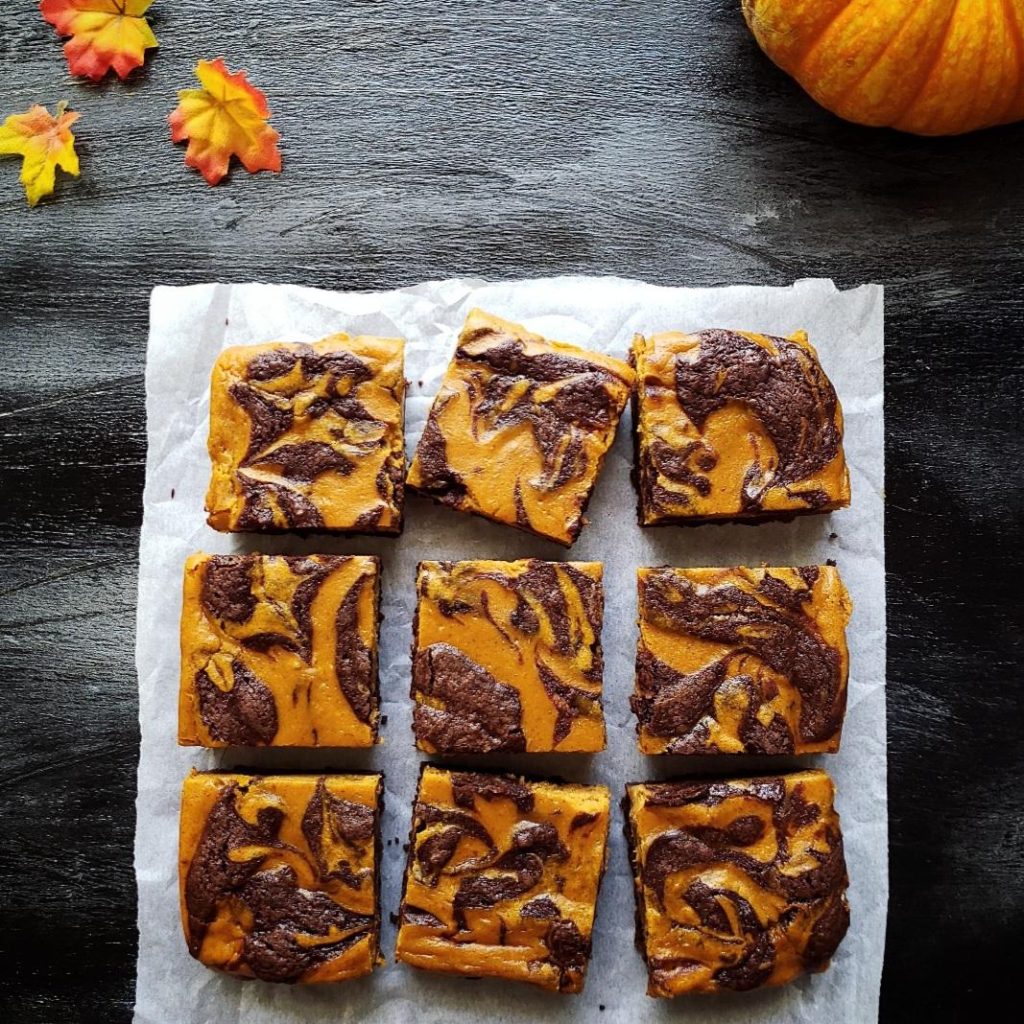 functional image small batch pumpkin cheesecake brownies cut into 9 squares top down
