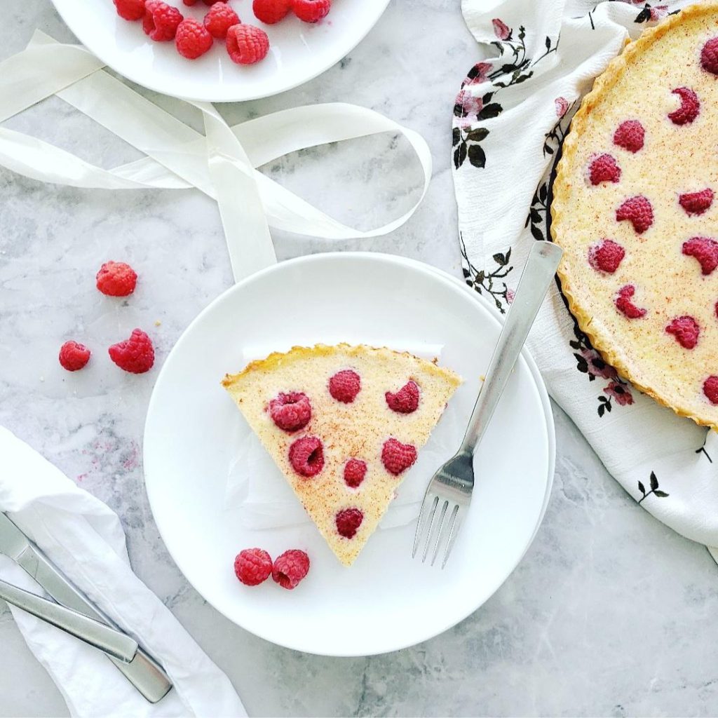 functional image raspberry mascarpone tart top down one slice on a plate 