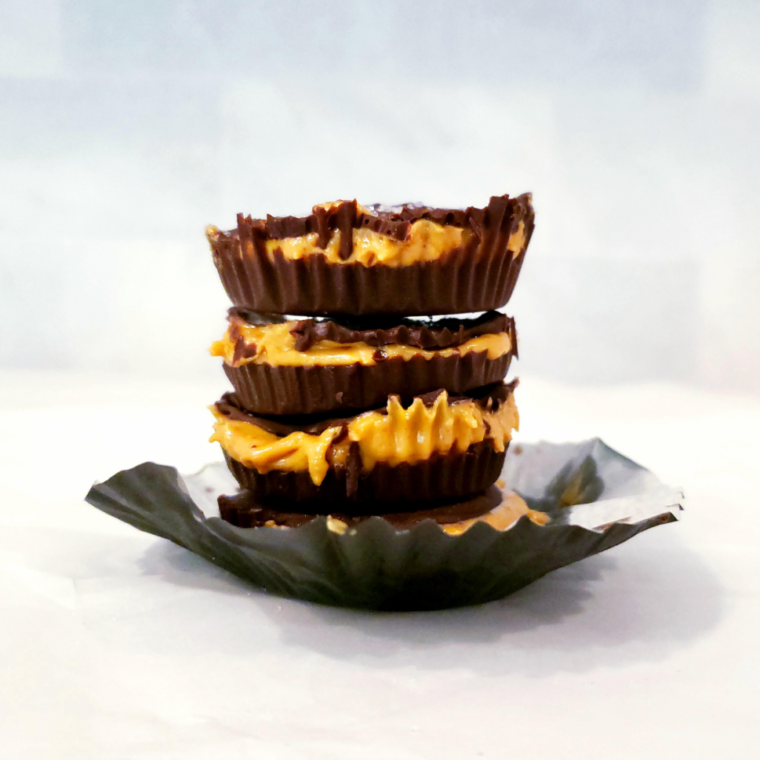 functional image homemade peanut butter cups with dark chocolate and sea salt stacked pb cups side view