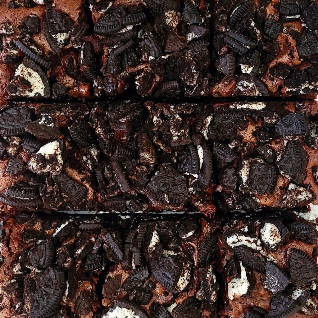 oreo brownies top down view of brownies topped with crushed oreo cookies zoomed in view